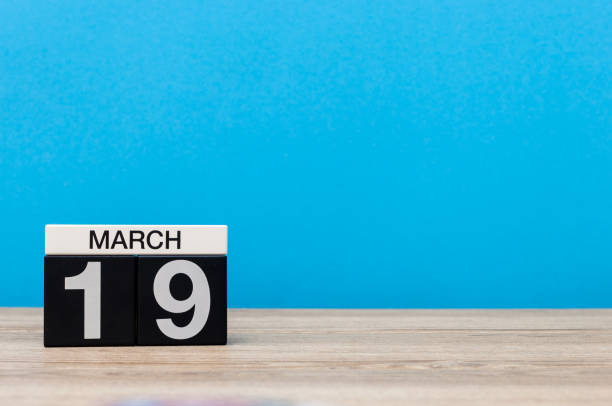 istock March 19th. Day 19 of march month, calendar on light blue background. Spring time, empty space for text, mockup 931025824