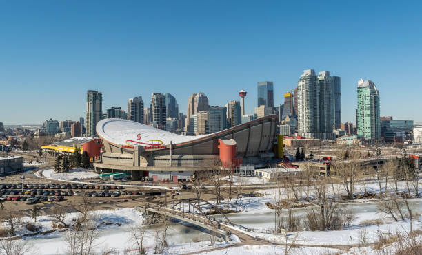 CALGARY - March 11. 2018: View of Calgary downtown and Scotiabank Saddledome during the sunny winter day CALGARY - March 11. 2018: View of Calgary downtown and Scotiabank Saddledome during the sunny winter day scotiabank saddledome stock pictures, royalty-free photos & images