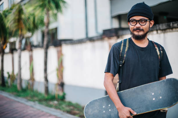 istock Guy with skateboard outdoors 931034960
