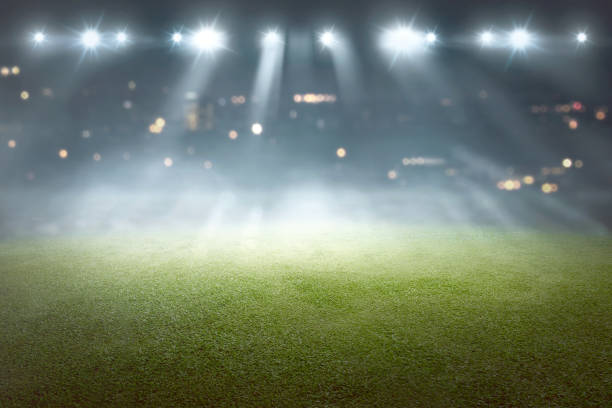 soccer field with blur spotlight - soccer stadium fotografia de stock imagens e fotografias de stock