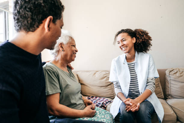 istock Nurse visiting senior lady at home 931042180