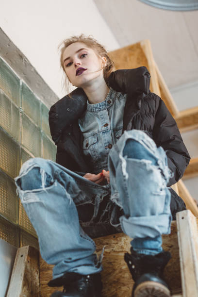 istock young girl in ripped creative jeans 931047928