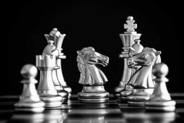 istock Strategy chess battle Intelligence challenge game on chessboard. Success the strategy concept. Chess business leader and success idea. Chess strategy game business competition success play. 931051928