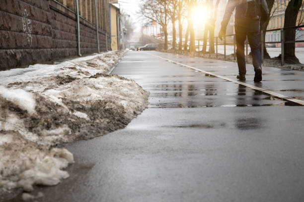 melting snow in the city streets