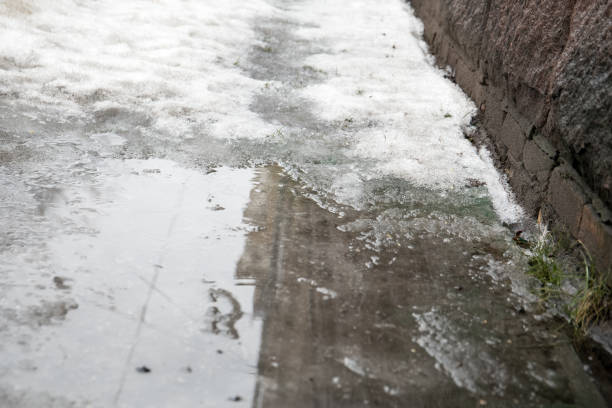 istock melting snow in the city streets 931053170