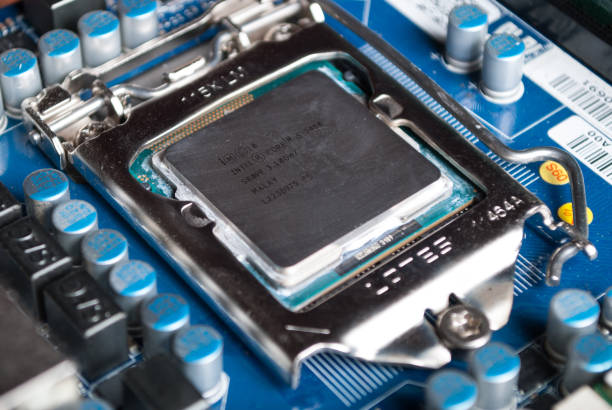 CPU Intel i5 on computer motherboard in socket stock photo