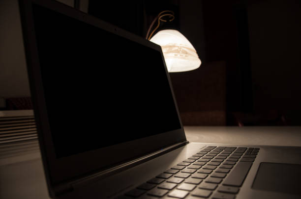 istock Laptop and lamp on the desk in workplace 931058784