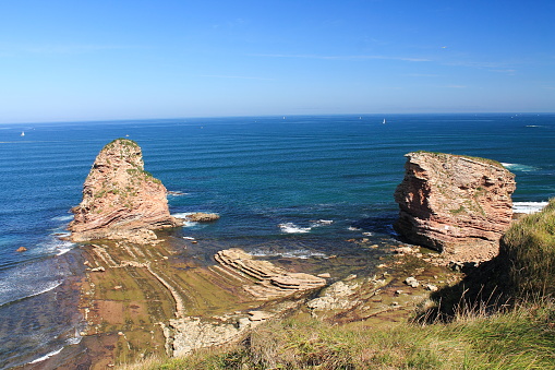 high angle view on atlantic coastline with deux jumeaux, hendaye, basque country, france