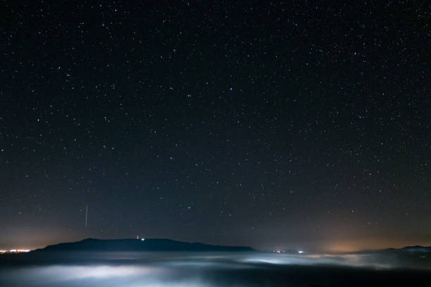 istock milky way galaxy long exposure photograph with grain. 931068954