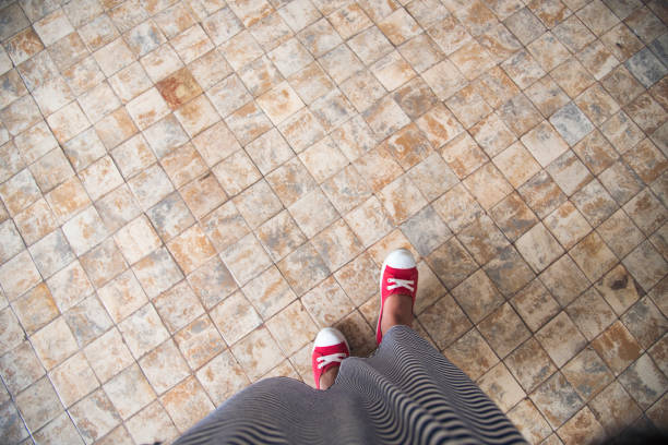istock Confident Woman wear red sneaker. Ready for travel. 931075350