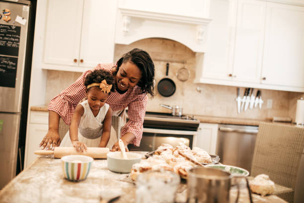 istock Mom and toddler baking together 931078082