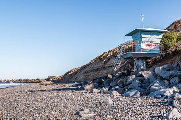 istock Lifeguard Tower on South Carlsbad State Beach with Power Plant Tower 931078336