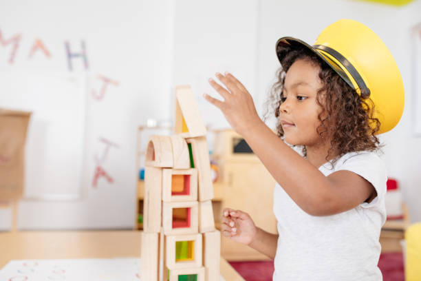 istock Adorable toddler trying new hat 931078466