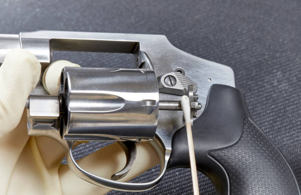 istock Cleaning the Ejector on a Snubnose Revolver 931082942