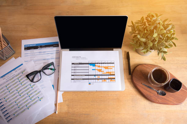 istock Top viw of office stuff with notepad, laptop and coffee cup mouse notepad top view shot. 931087338