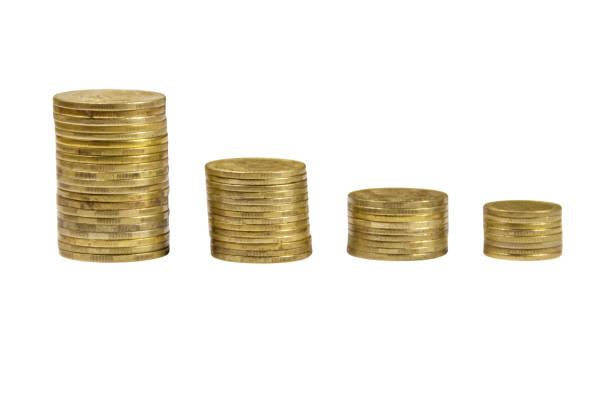 istock Stacks of golden coins isolated on white background 931095864