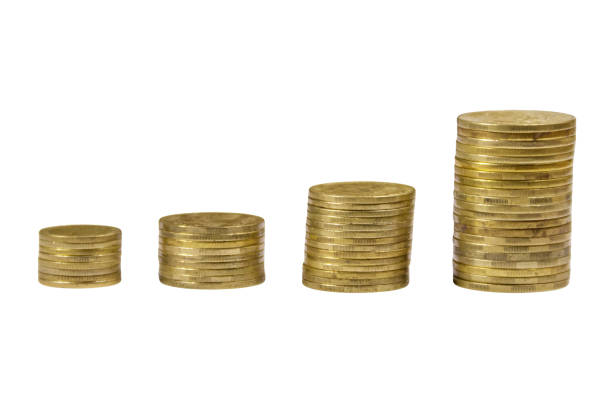 istock Stacks of golden coins isolated on white background 931095874
