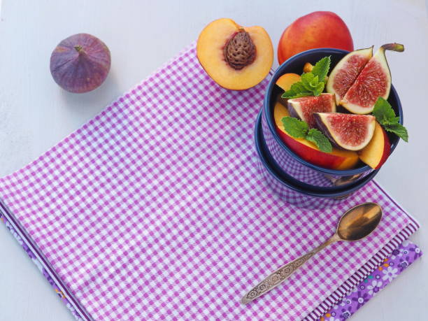 . Healthy eating concept. Fruit salad in a blue vase. Copy space for your text. stock photo
