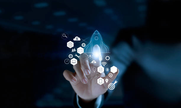 istock Startup concept. Businessman touching icon transparent rocket is launching and flying out with icon network connection on modern virtual interface. 931102780