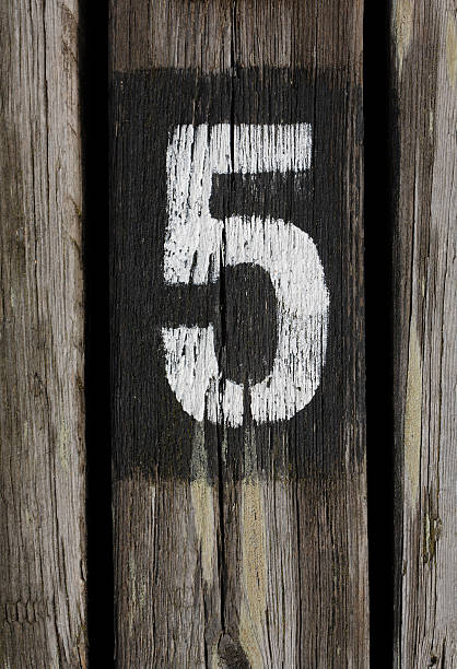 istock The number five on a wooden post 93110353