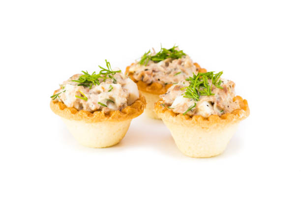 istock Tartlets with salad from canned fish and eggs 931106636