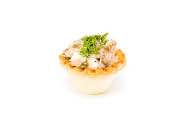 istock Tartlet with salad from fish and eggs 931106640