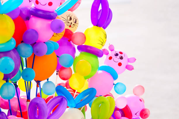 istock Beautiful colored balloons on white background. Multicolored surprise childhood background. 931113602