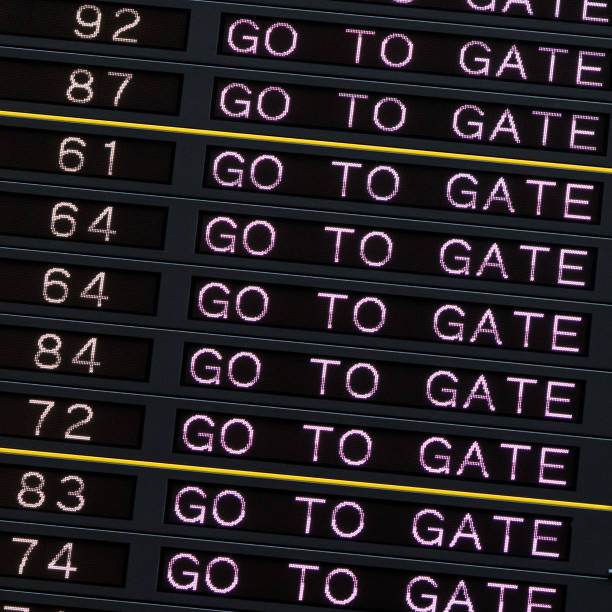 istock Airport departure board with go to gate sign. 931119376