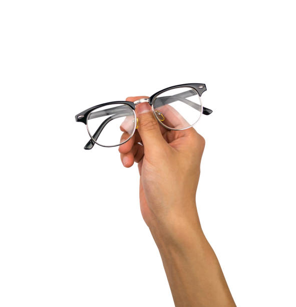 istock Vintage Eye glasses hand holding on white background, with clipping path 931122072