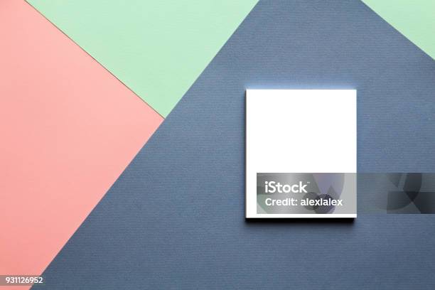 Abstract Geometric Watercolor Paper Background In Trend Colors With Notebook Stock Photo - Download Image Now