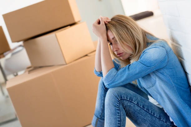 istock Tired woman exhausted while moving into new home 931143084