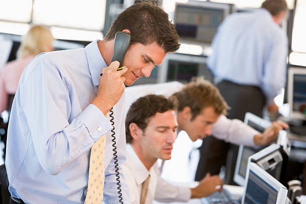 Stock Trader On The Phone  dealing room photos stock pictures, royalty-free photos & images