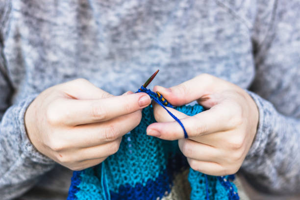 istock Woman knits closeup 931159416