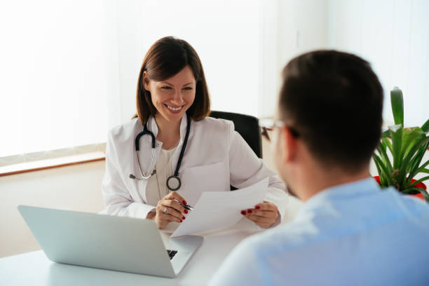 istock Female doctor talking to patient 931161088