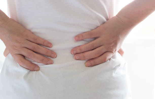 istock Close up hands touching back pain, office syndrome. 931163456