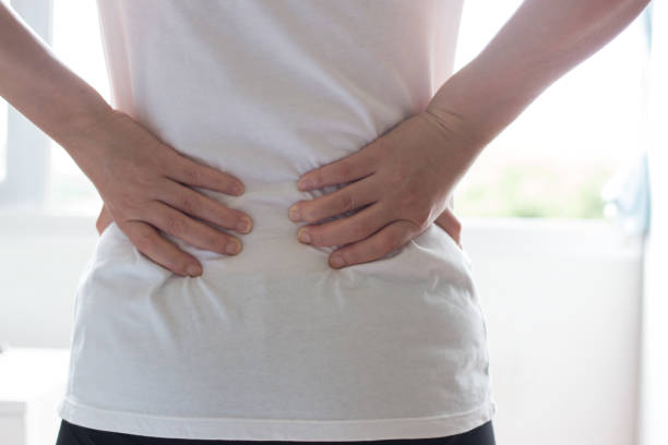 istock Close up hands touching back pain, office syndrome. 931163508