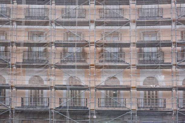 istock Scaffolds on an antique building. Restoration works. Architecture, construction 931168030