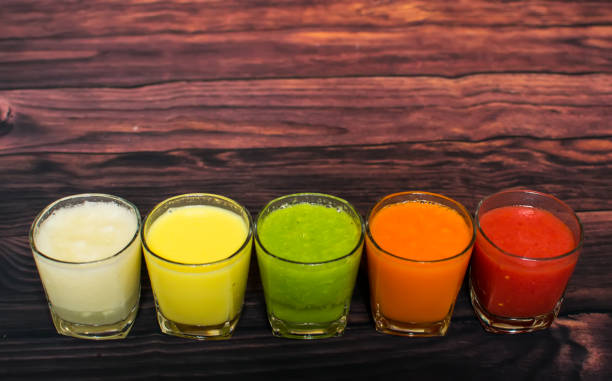 istock Healthy smoothies with fresh ingredients on a kitchen board 931169170