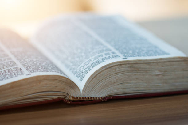 istock bible,women reading from the holy bible 931171518