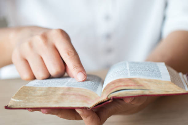 istock bible,women reading from the holy bible 931171520