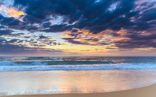 istock Sunrise Seascape at the Beach with Clouds 931173222