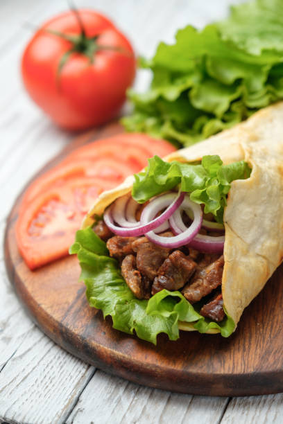 istock Doner kebab is lying on the cutting board 931178650