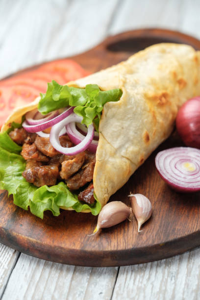 istock Doner kebab is lying on the cutting board 931178800