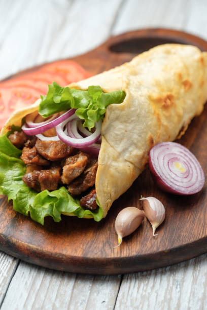 istock Doner kebab is lying on the cutting board 931179368