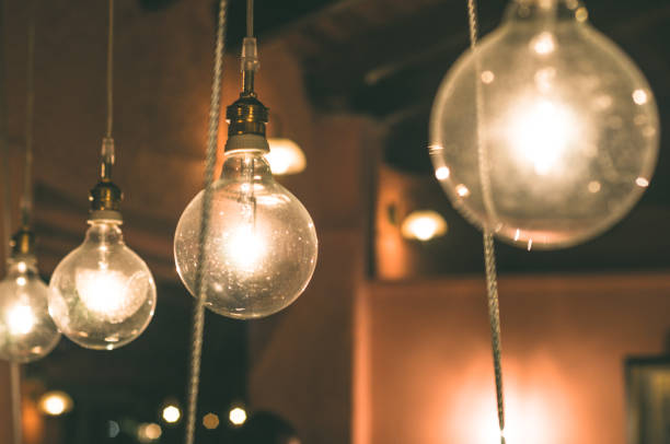 istock Ceiling lamps at the bar. Light bulbs. 931179602
