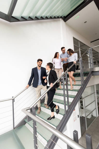 istock Corporate teamworking colleagues in modern office 931184272