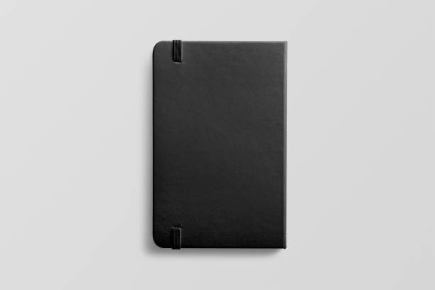 istock Photorealistic black leather notebook mockup on light grey background. 931197410