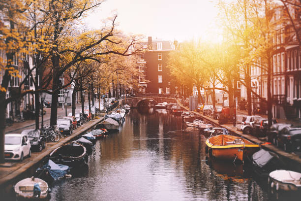 istock Amsterdam cityscape with canal and bridges in Netherlands 931197894