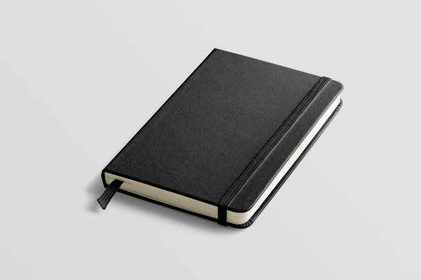 istock Photorealistic black leather notebook mockup on light grey background. 931198642