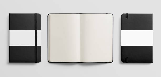 istock Photorealistic black leather notebook mockup on light grey background. 931204030